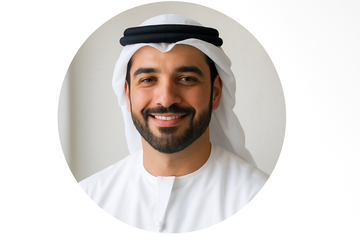 “Circular headshot of an Emirati man in his mid-30s, short beard, wearing a white kandura and ghutra, confident smile, soft daylight, minimal background.”